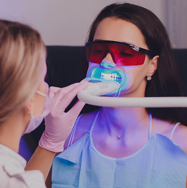 close-up-portrait-female-patient-visiting-dentist-teeth-whitening-clinic-teeth-whitening-procedure